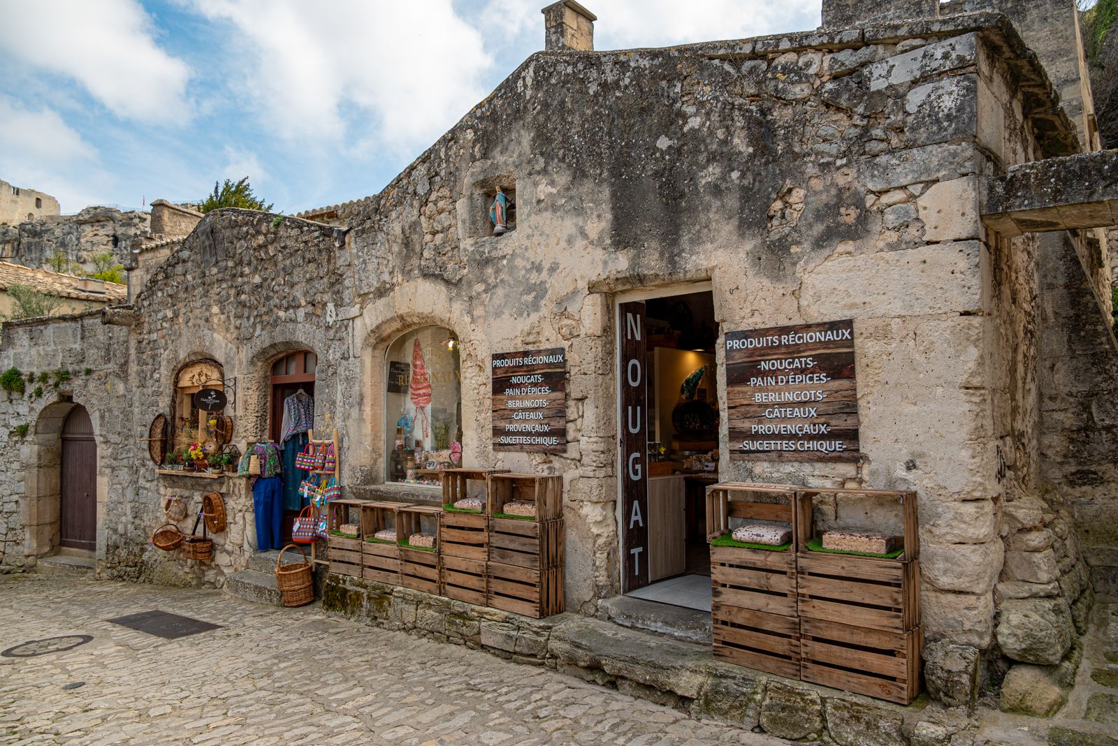 An old stone house carved into the rock in Les Baux-de-Provence