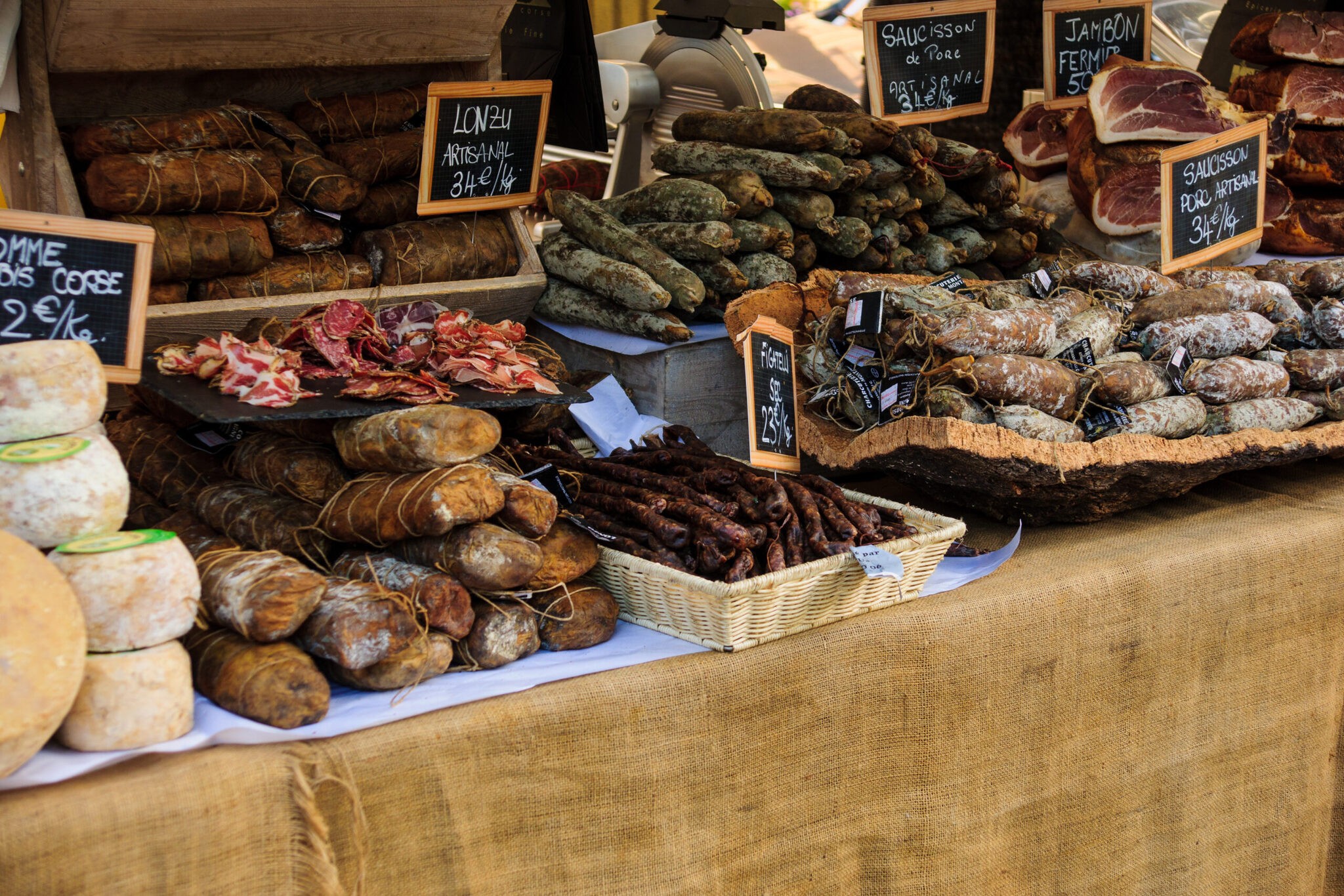 A French winter market stall, prices chalked on slates